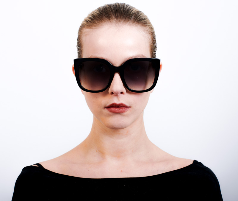 Alexis Amor Orla sunglasses in Gloss Piano Black + Marble